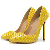 Christian Louboutin Enameled Spike Studded Yellow Leather Pumps